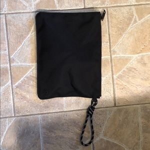 Lululemon black nylon clutch with rope wristlet.